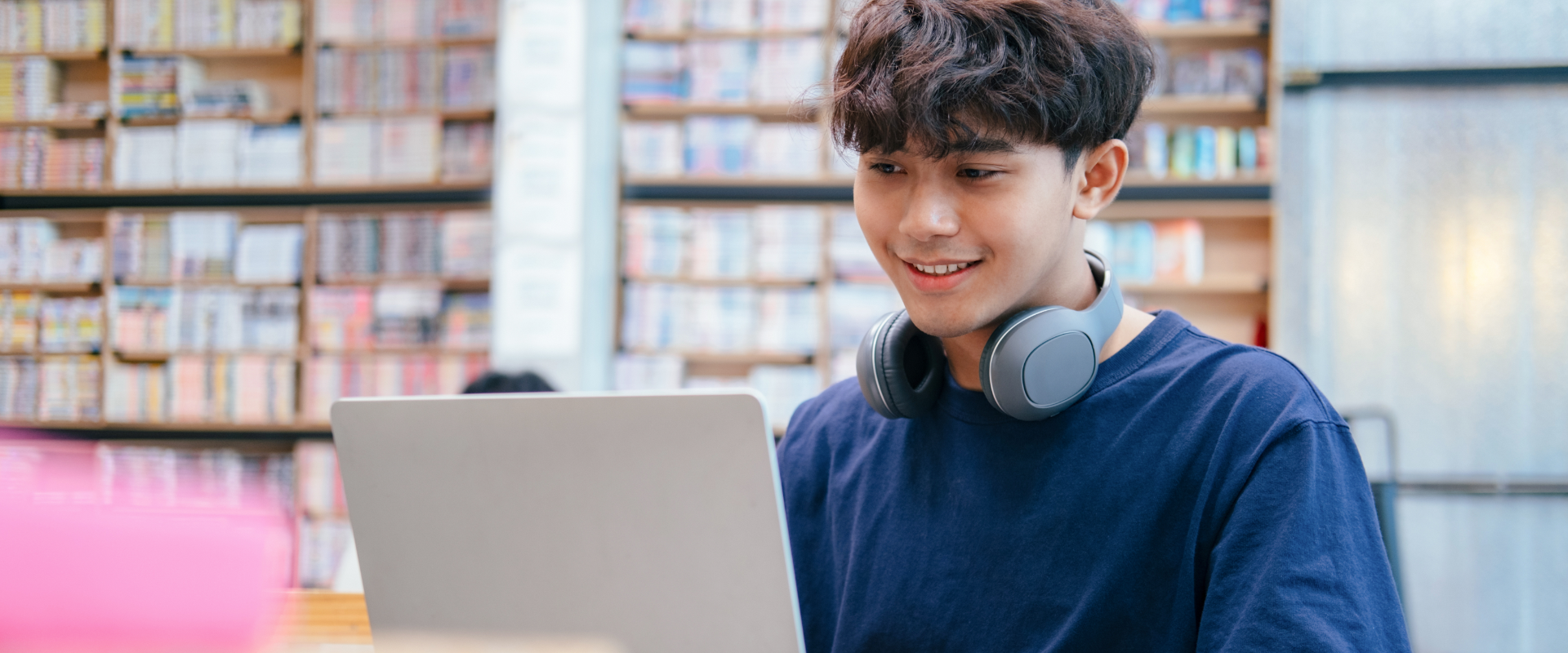 Student studying on a laptop.