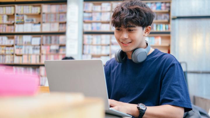 Student studying on a laptop.